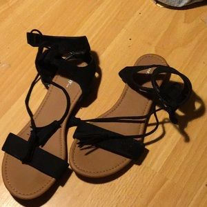 black and brown sandals